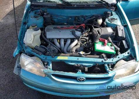 1999 Toyota Corolla Ce из США, поврежденный, VIN 2T1BR12E6XC134802